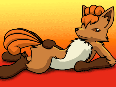 A Vulpix lying down and wagging its tails
